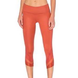 ALO Yoga Edge Capri Sunbaked Glossy Orange Mesh Leggings Cropped Sz Medium
